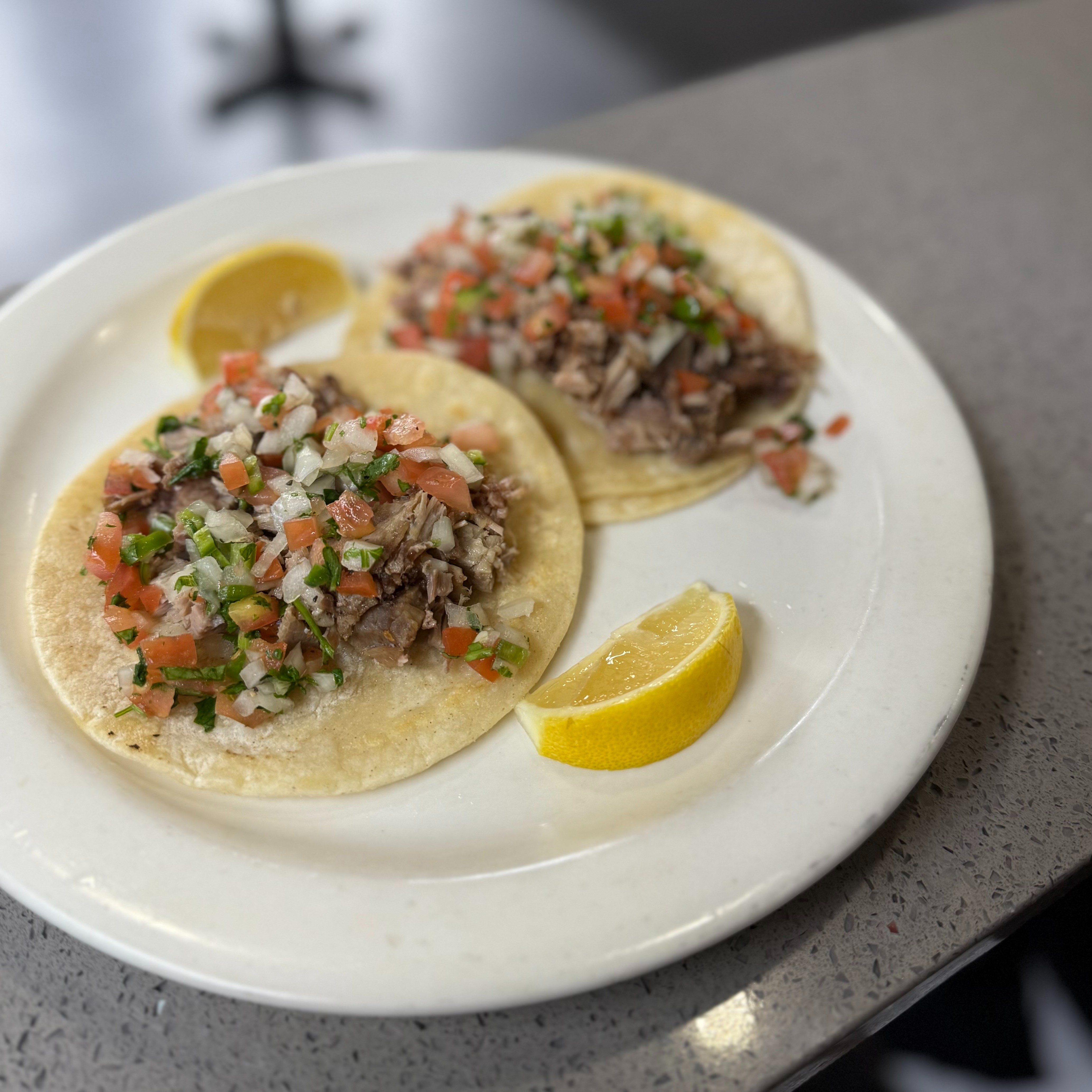 Tacos de Carnitas (pork tacos).
