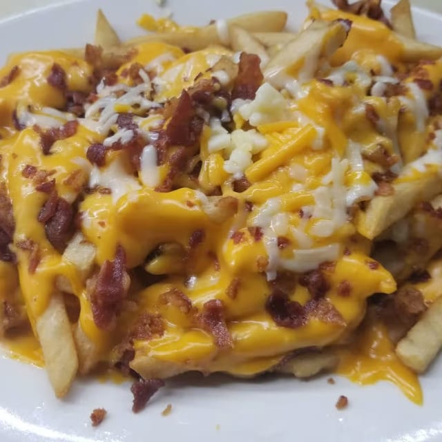 French Fries with Cheese & Bacon.